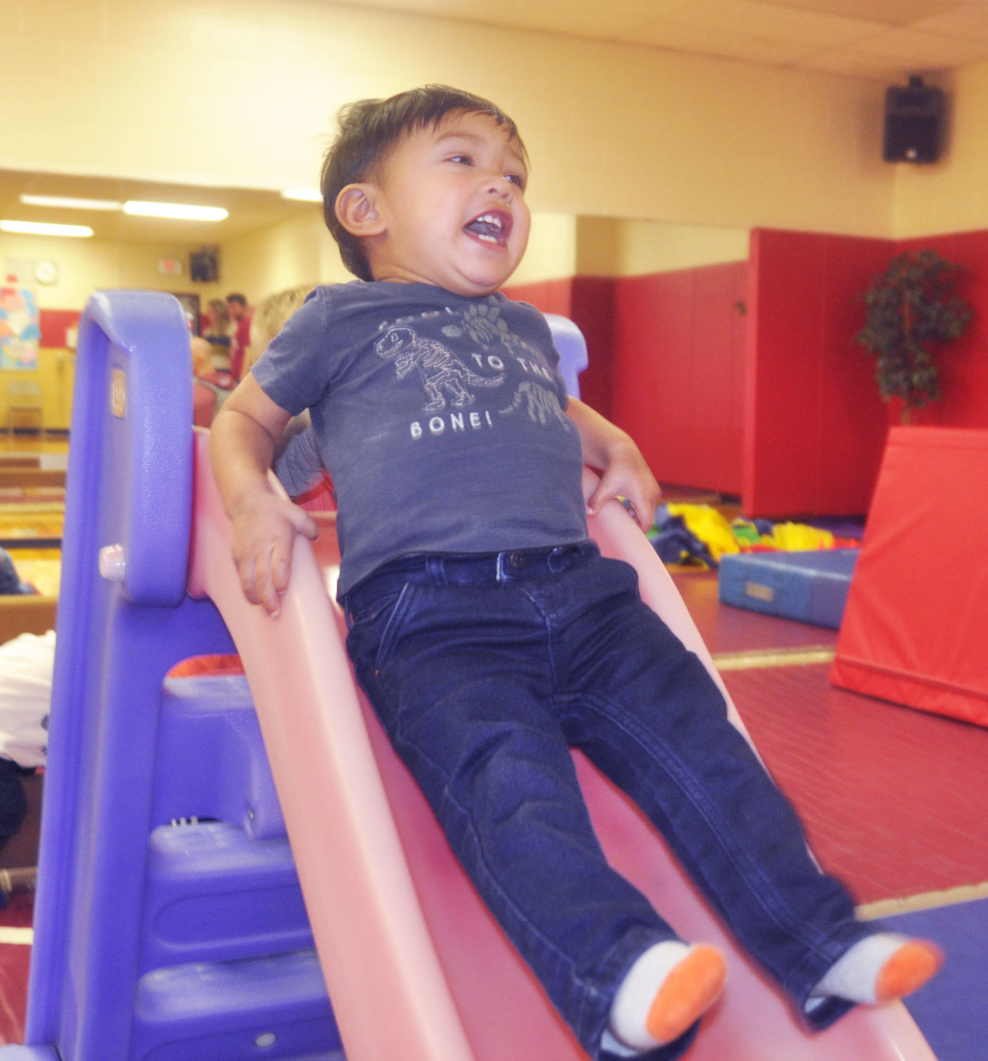 Kids Expo - toddler on slide